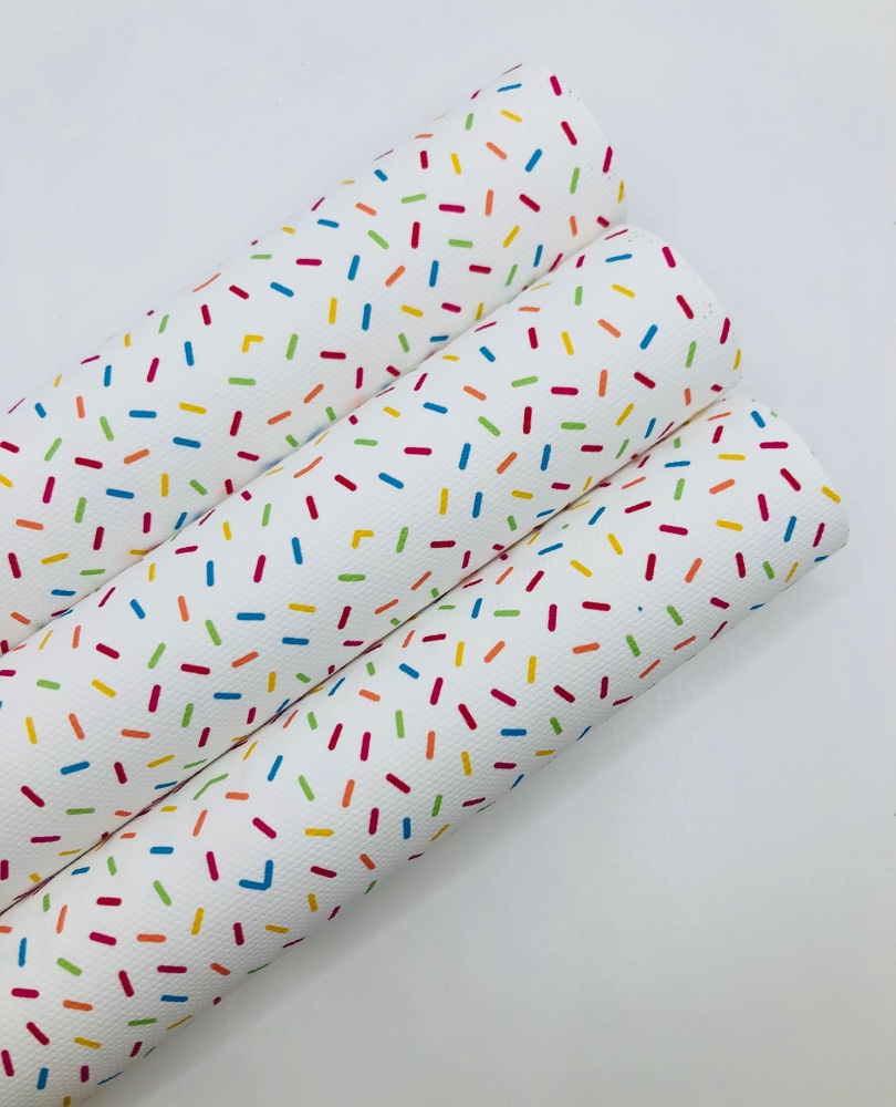 1128 - Sprinkles white background printed canvas fabric