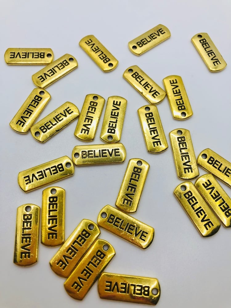 Golden believe christmas charm embellishment