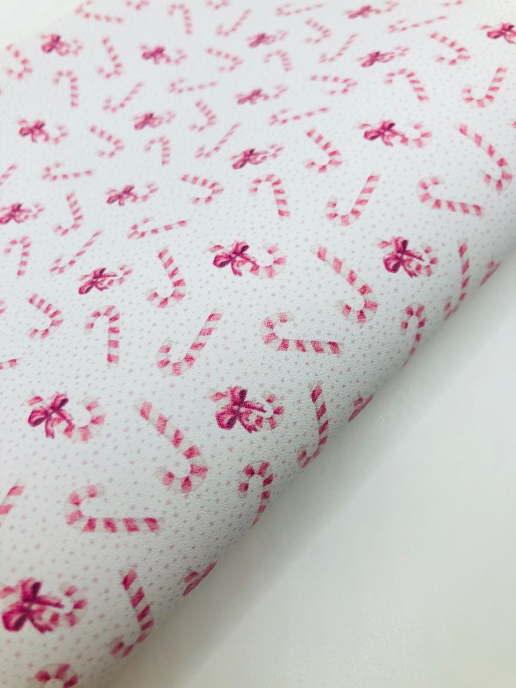Pink christmas candy cane printed leather fabric