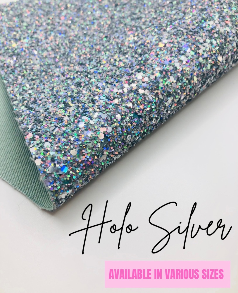 PRETTY PLAIN LUXURY -  Holo Silver chunky glitter fabric