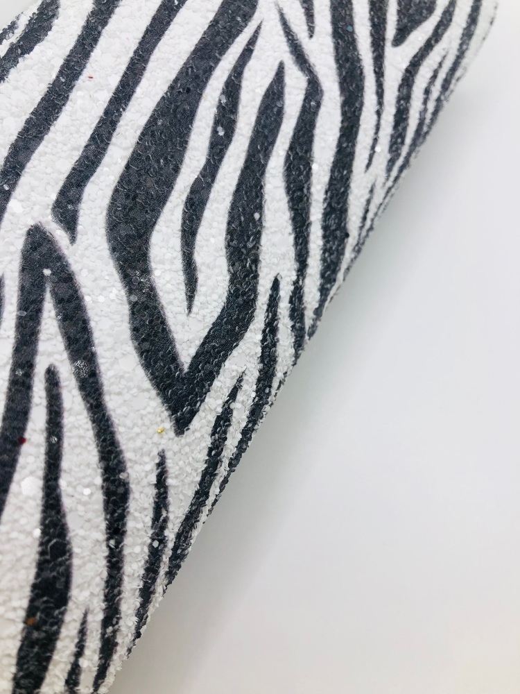 Luxury black & white zebra chunky glitter fabric