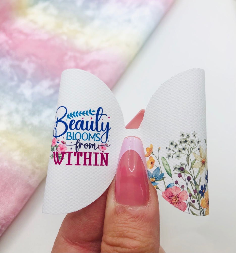 Beauty blooms from within flower pre cut bow loop