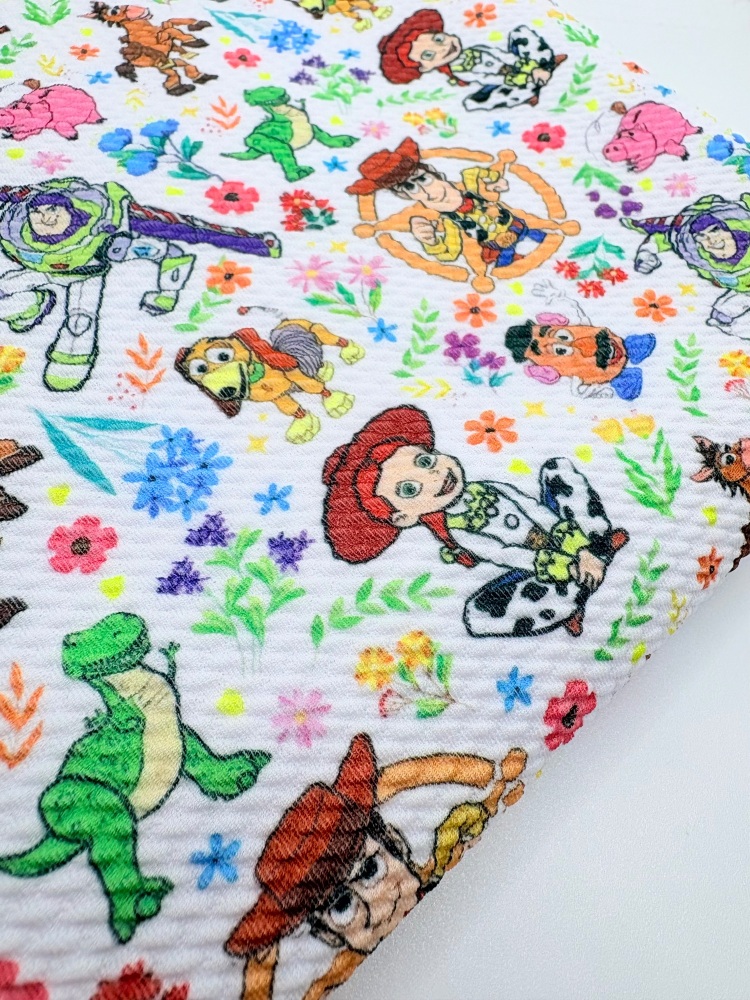 TS floral woody mixed toy character story Printed Bullet Fabric