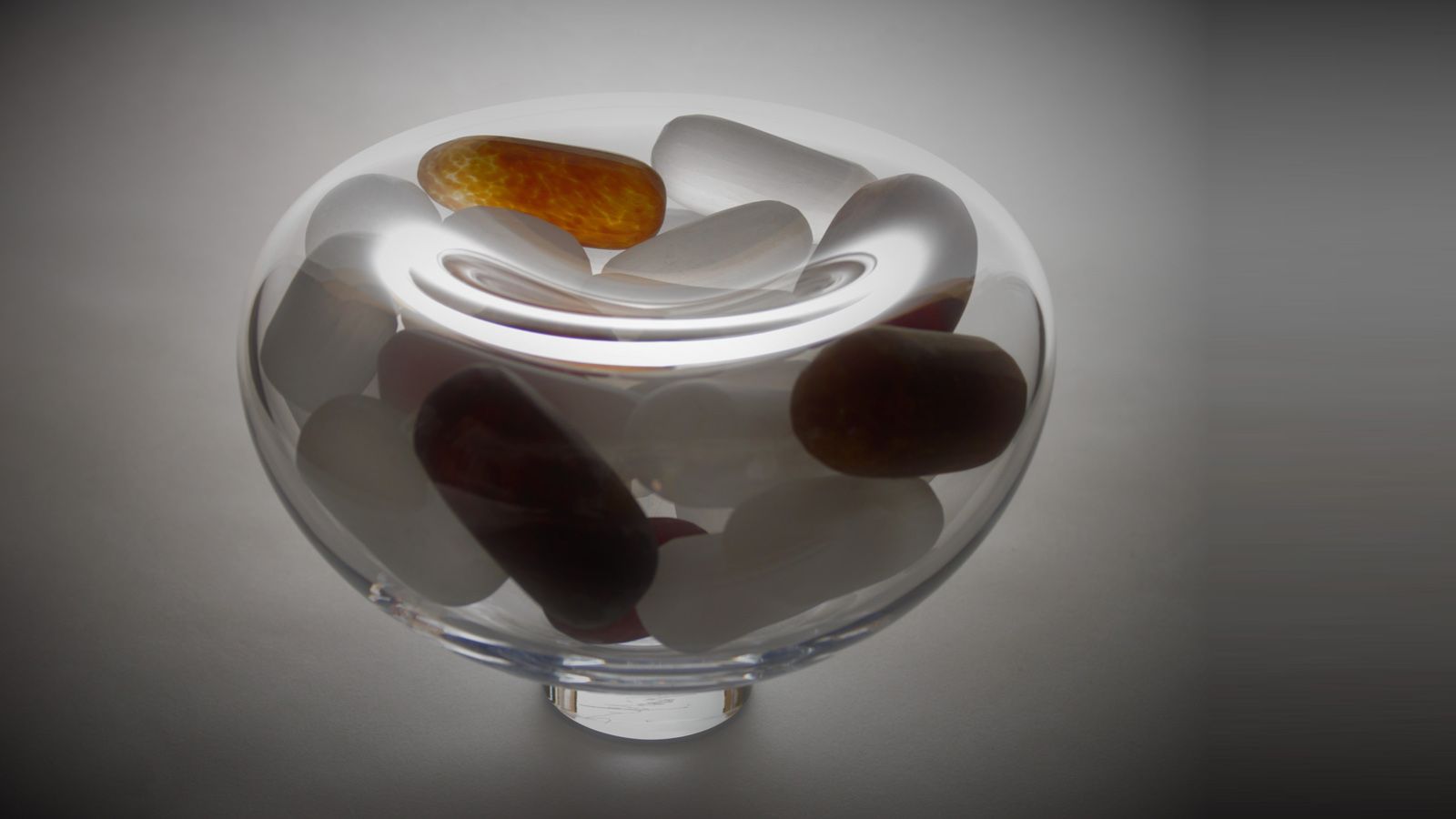 Stewart Hearn Amber Stone Bowl angled, Unique handmade Glass Gifts, Glass Blowers UK, UK Glass blowing workshop