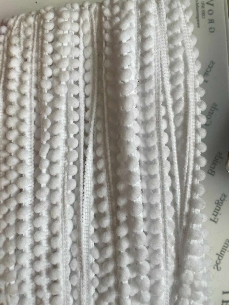 Tiny pom pom - sold by the metre - White