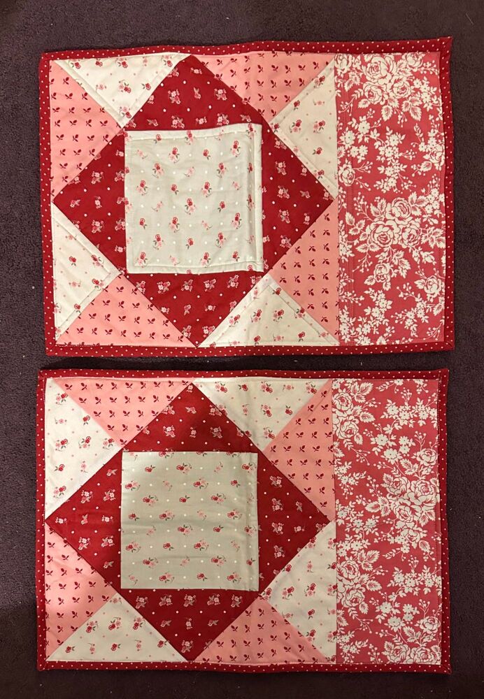 Two red/pink/cream Placemats - 13" x 18"