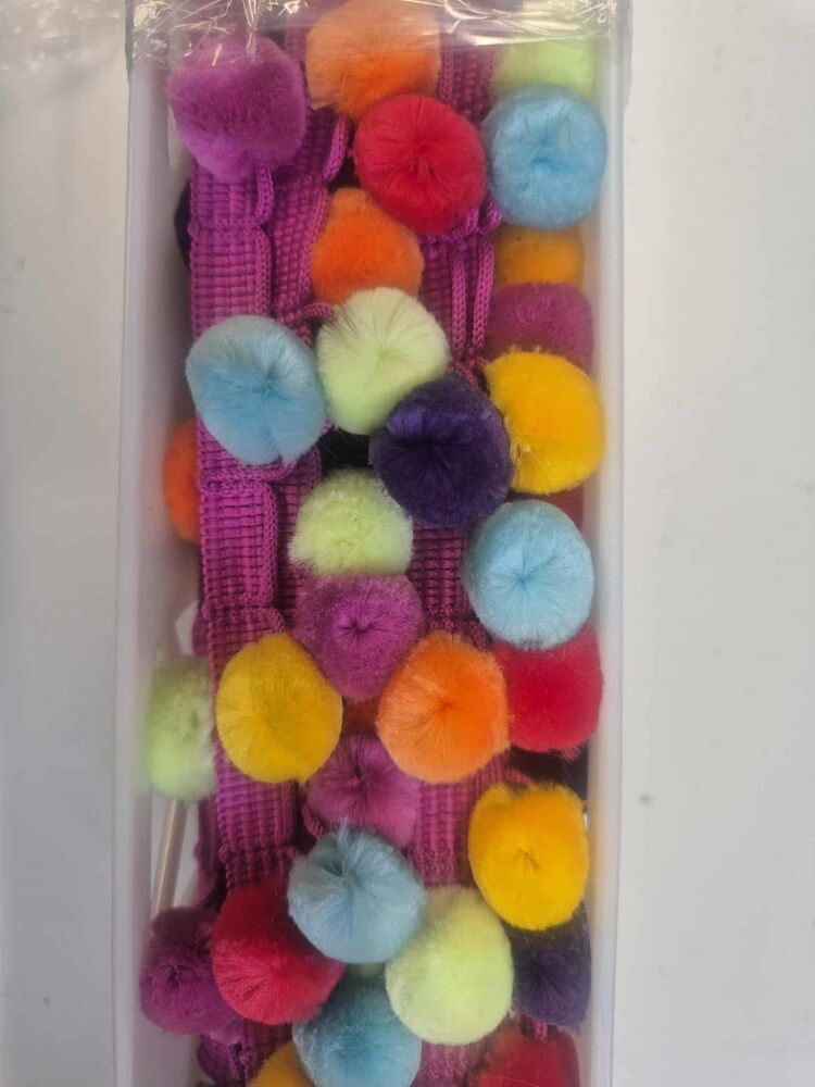 Large pom pom  - sold by the metre - jewel tone on pink band