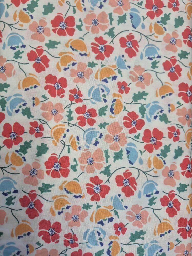 Sew Cool 60" red/peach/gold/blue flowers on white 8099-1
