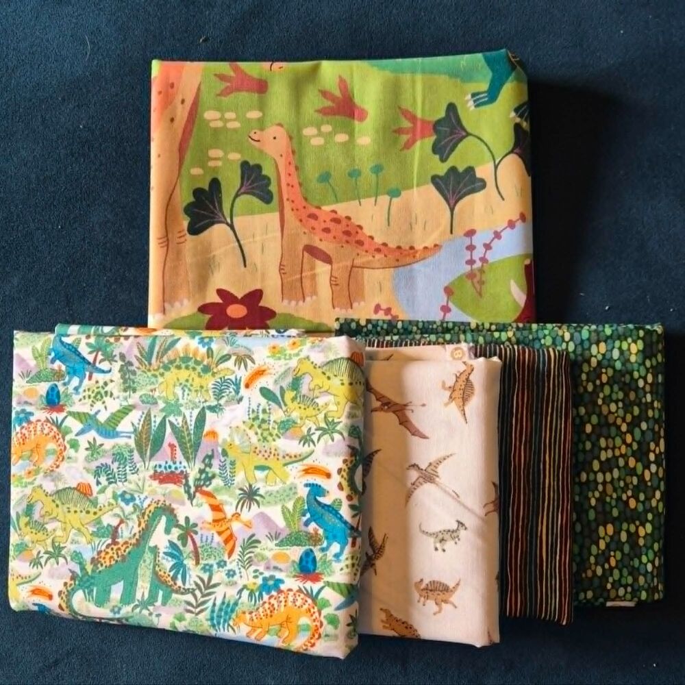 Makower Prehistoric Dinosaur Panel & coordinating fabrics was &pound;42.99 now &pound;30