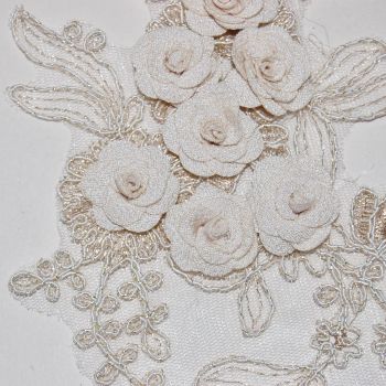 PAIR OF INTRICATE SEW ON EMBELLISHMENTS WITH FLOWERS, ON A VERY FINE NET.