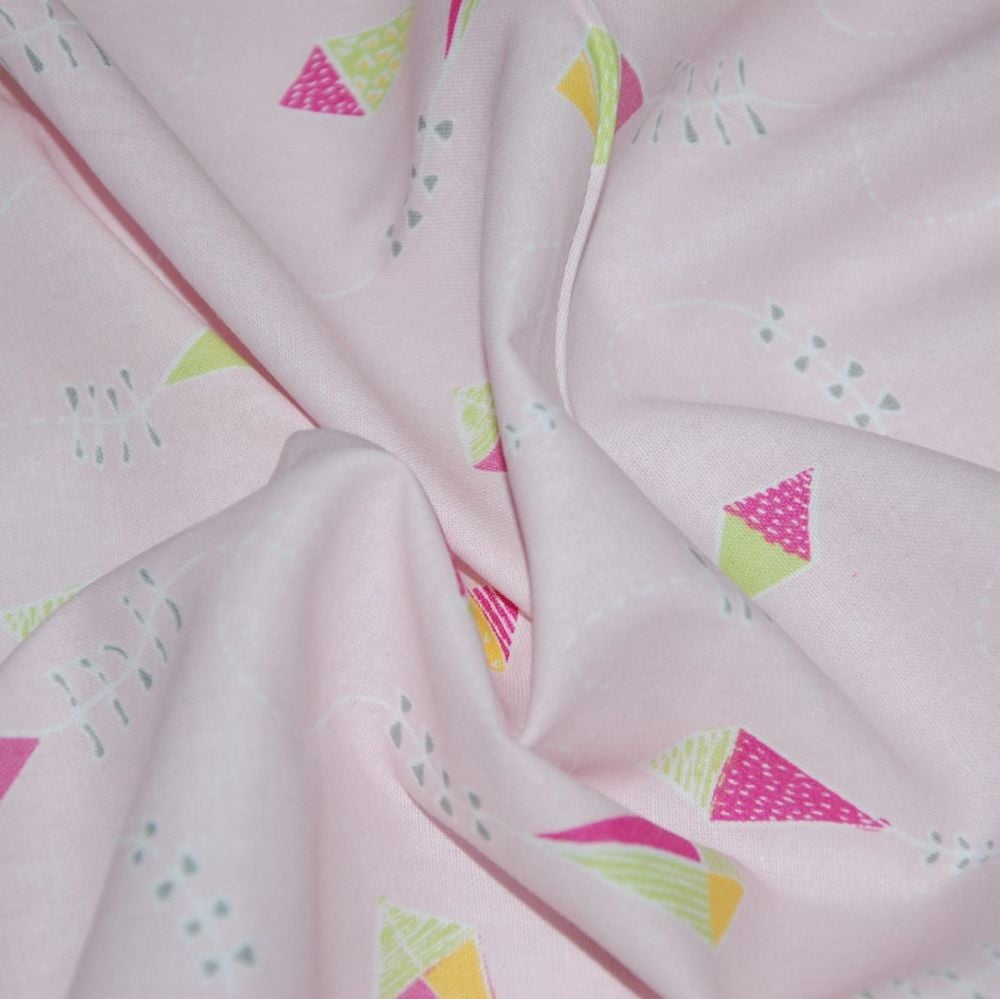 FLYING KITES ON A DELICATE PINK BACKGROUND, 100% COTTON.