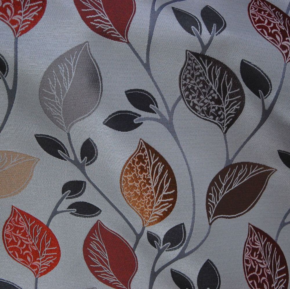 MODERN WOVEN COTTON MIX WITH LEAF PATTERN OCHRE, GREEN, BURNISHED RED.