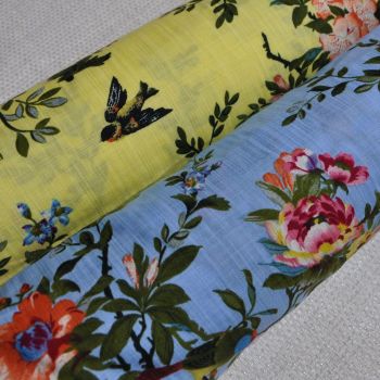 LINEN MIX DRESS WEIGHT FABRIC WITH FAUNA AND BIRDS IN YELLOW OR SKY BLUE