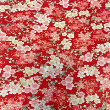 JAPANESE METALLIC 100% COTTON, MED WEIGHT.  SMALL FLORAL ON RED.