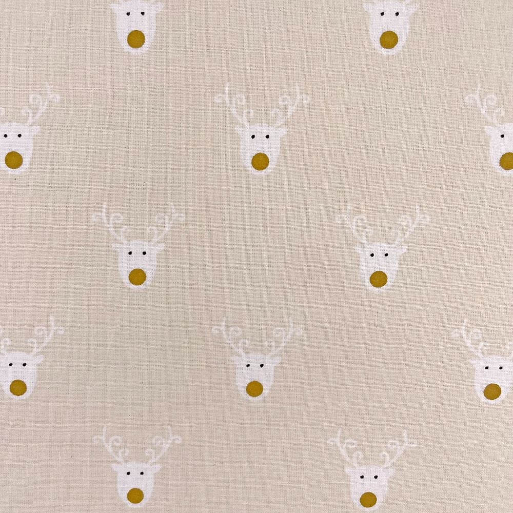 CHRISTMAS REINDEER ON CREAM, 140 CMS WIDE, 100% COTTON. MED WEIGHT.