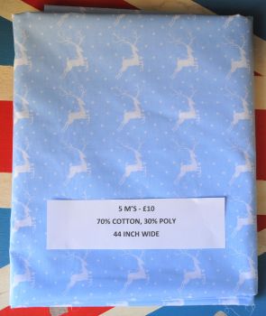 5 METRE PACK, 70% COTTON - 30% POLY, 44 INCH WIDE. LEAPING DEER ON PALE BLUE.