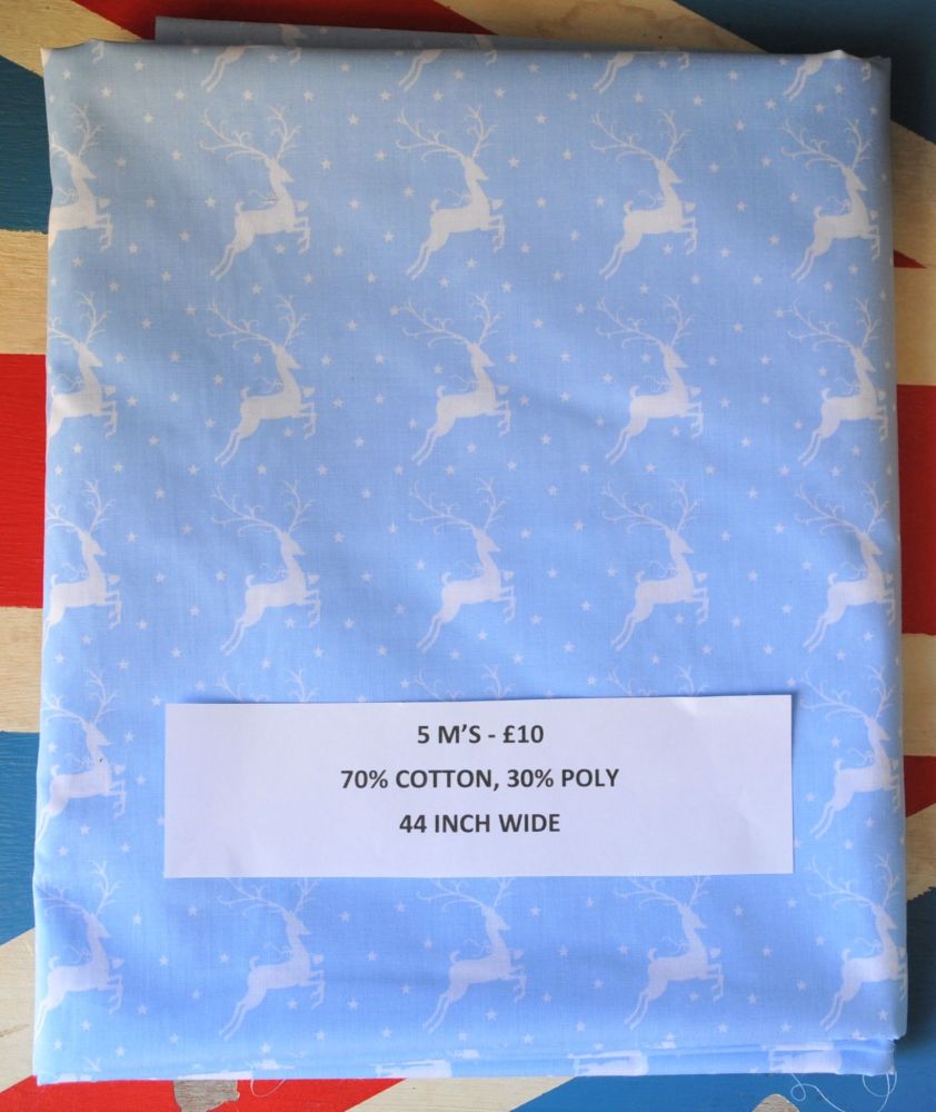 5 METRE PACK, 70% COTTON - 30% POLY, 44 INCH WIDE. LEAPING DEER ON PALE BLU