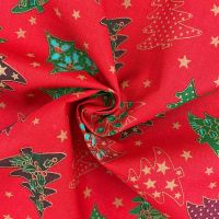 Christmas trees on red, 140cms wide, 100% cotton, med weight from Chatham Glyn.
