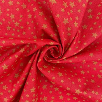 Metallic gold stars on red, 140cms wide, 100% cotton, med weight from Chatham Glyn.