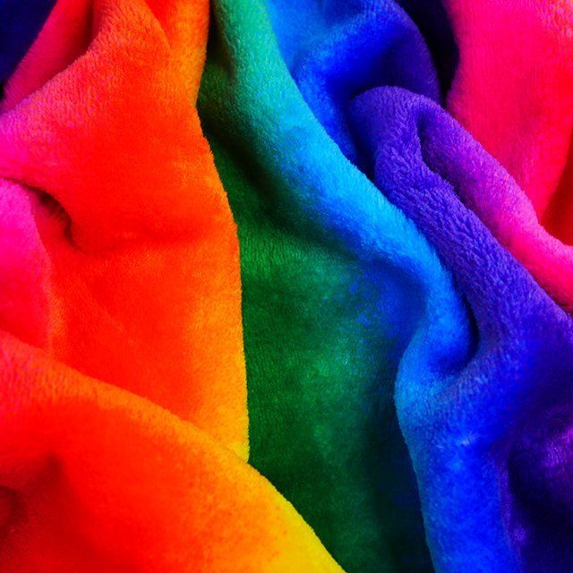 Bright rainbow supersoft cuddle fleece, 58 inch wide.