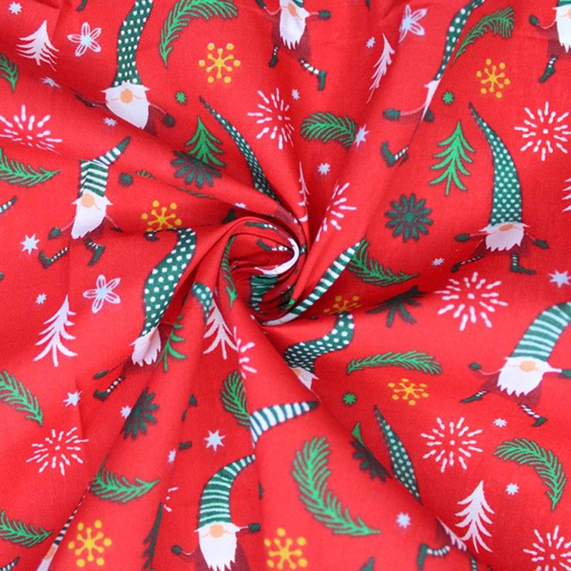Cotton/poly mix Christmas Gonk fabric in red.