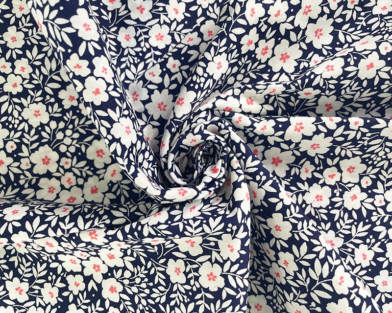 80% Cotton, 20% poly navy mindy floral.
