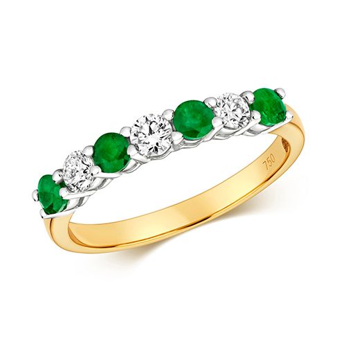 18CT DIAMOND AND EMERALD CLAW SET ETERNITY