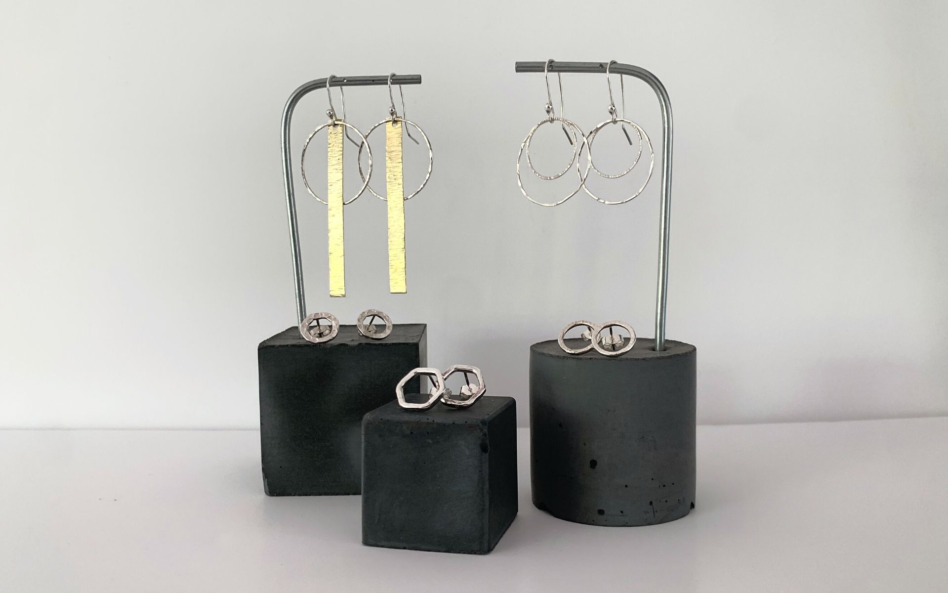 image of silver earrings you can make in a workshop