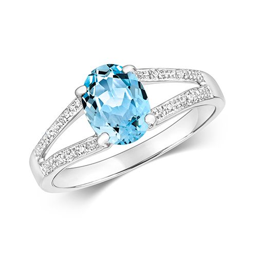9CT DIAMOND & OVAL AQUA RING