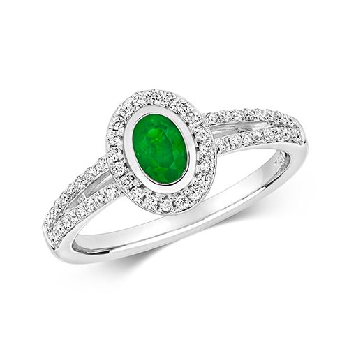 18CT DIAMOND CLUSTER OVAL EMERALD RING