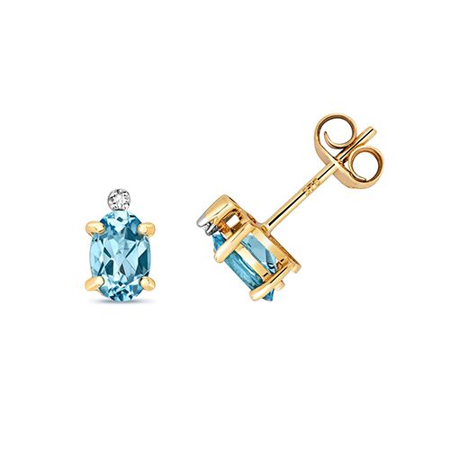 9CT DIAMOND & BLUE TOPAZ STUDS