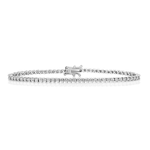 18CT TENNIS 3.37CT BRACELET 2 CLAW