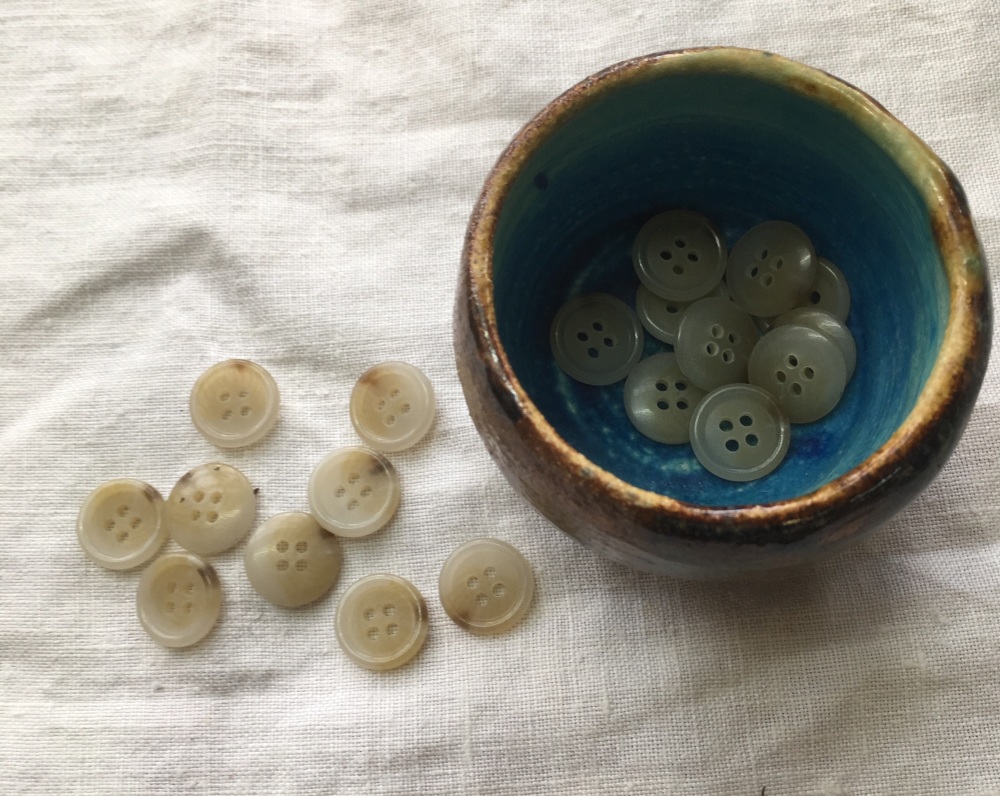 Buttons for arm fixings 
