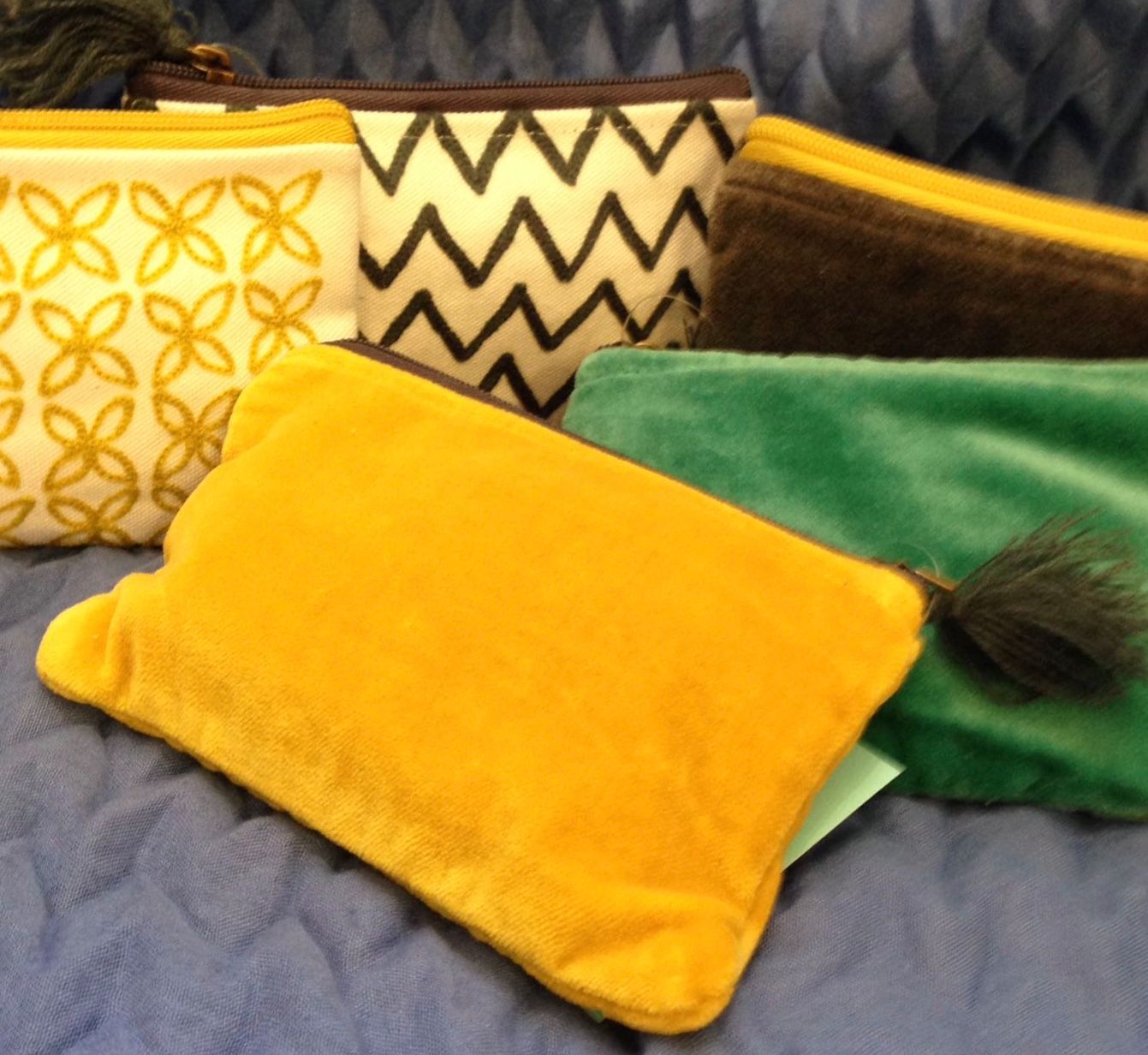 Pom's selection of velvet and embroidered purses