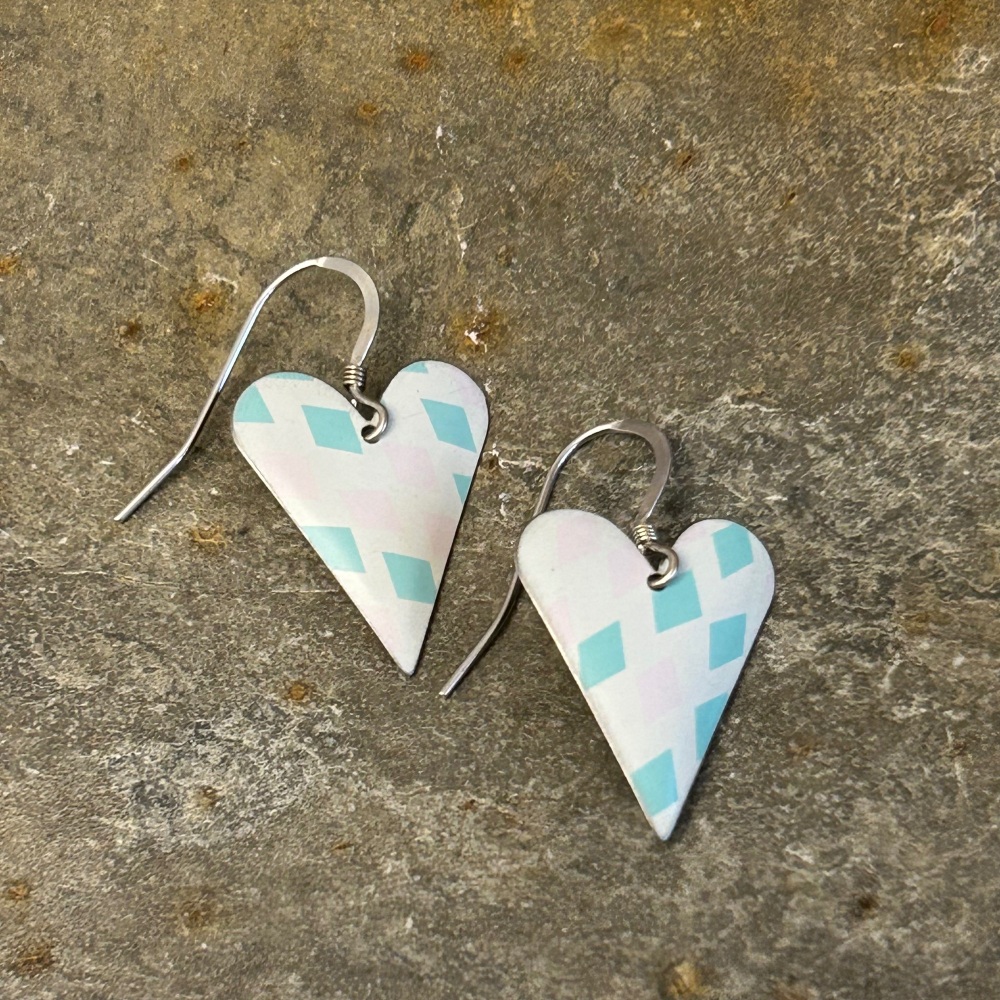 Tin earrings on sale