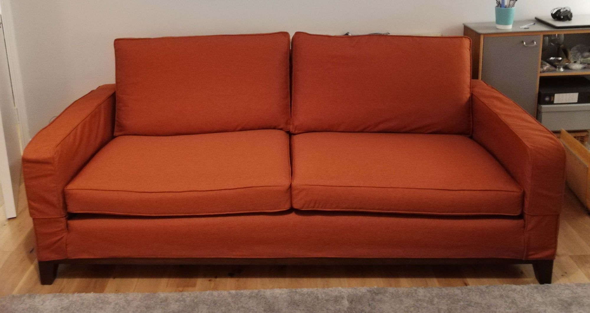 Sofa cover with piping