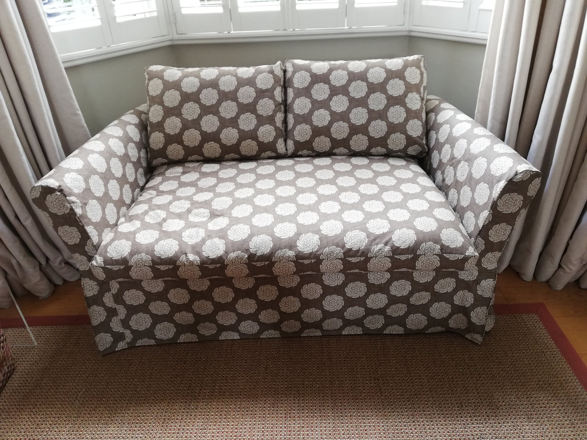 Designers Guild sofa cover in brown and white