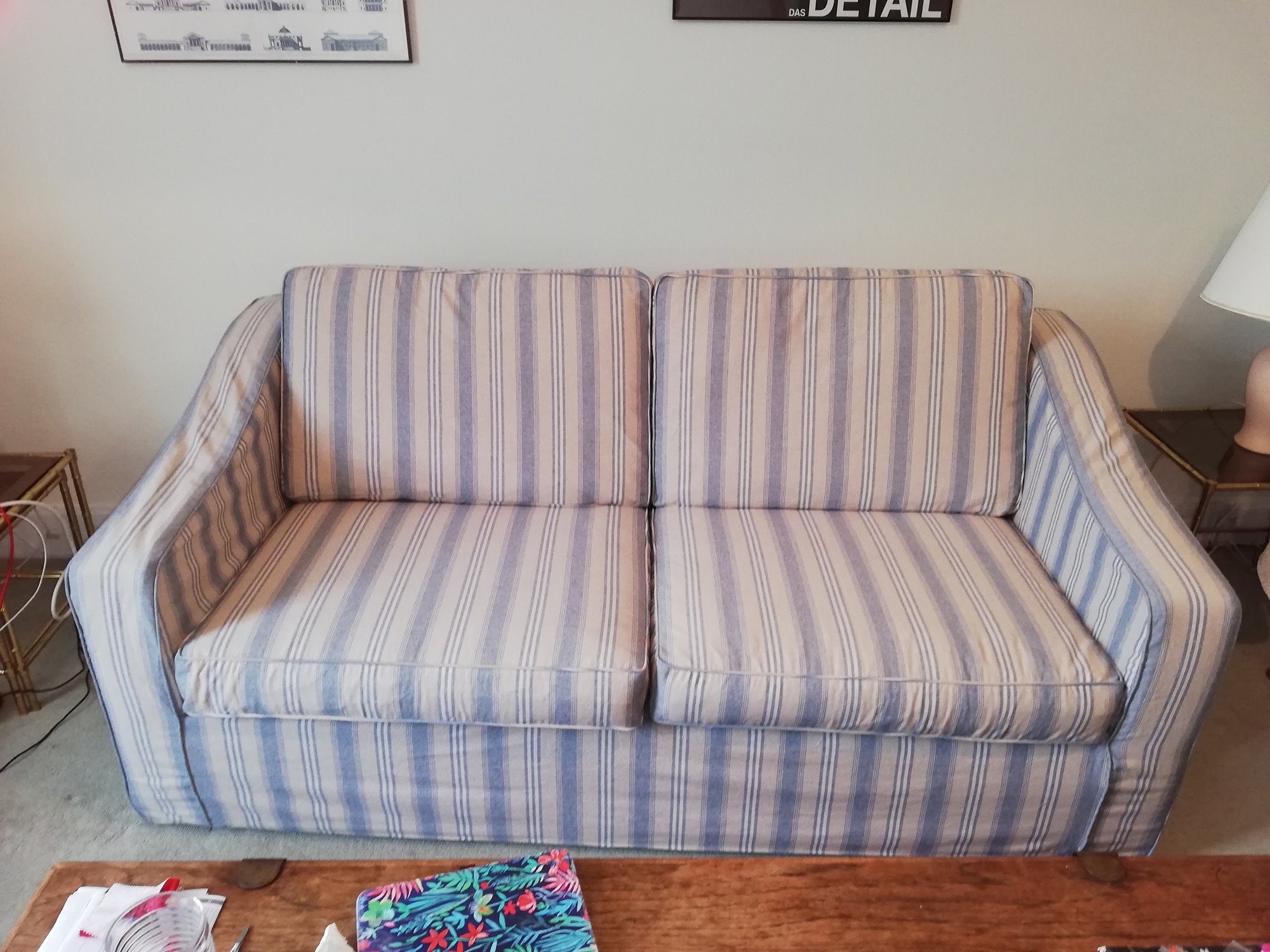 Grey and blue striped sofa cover