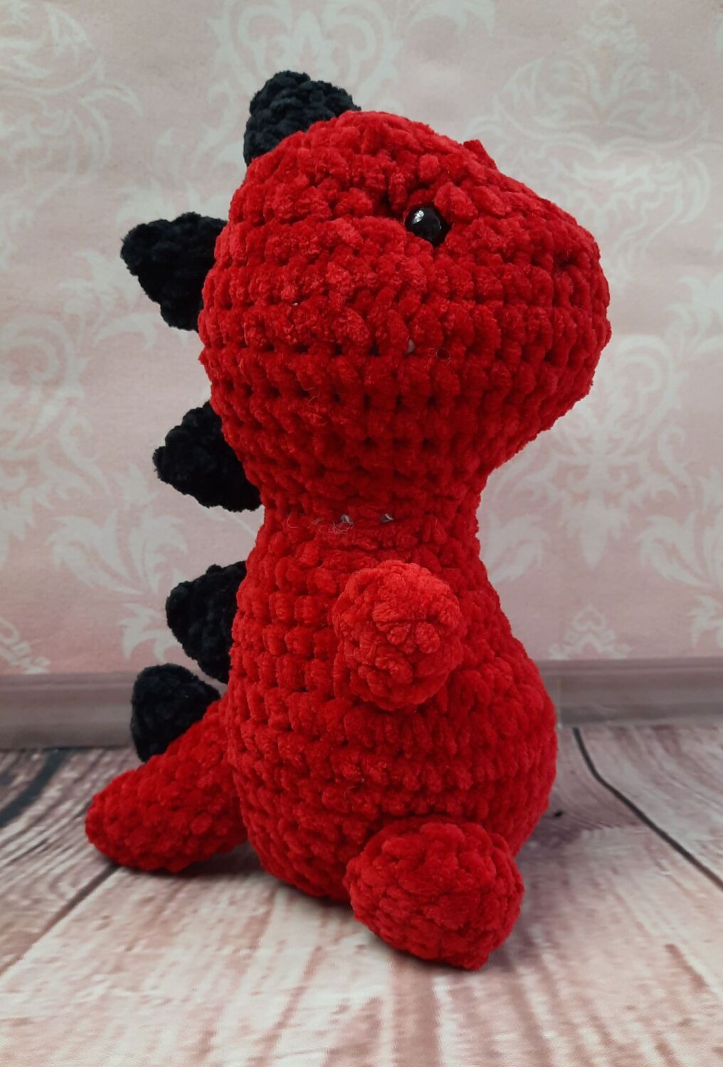 Hand crocheted dinosaur in quality chenille yarn. (9 inches/23cm).