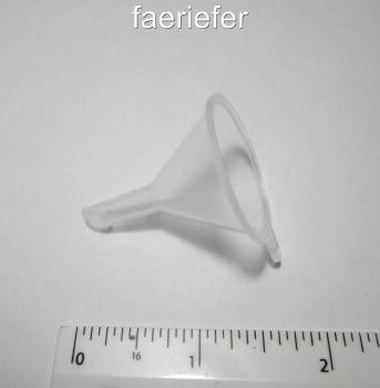 Plastic funnel for filling small bottles or globes with faerie dust