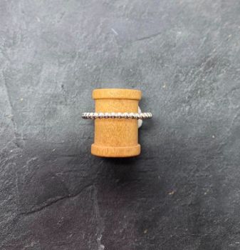 Silver small bead ring.