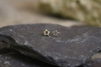 Yellow gold star stud earrings