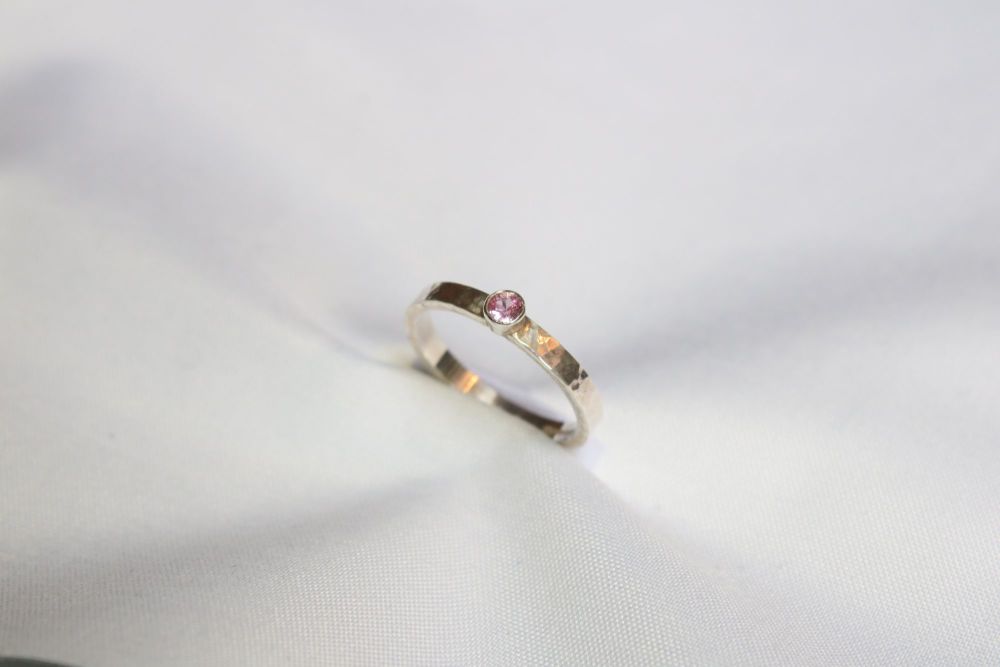 Pink sapphire, silver ring.
