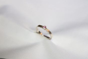 Pink sapphire, silver ring.