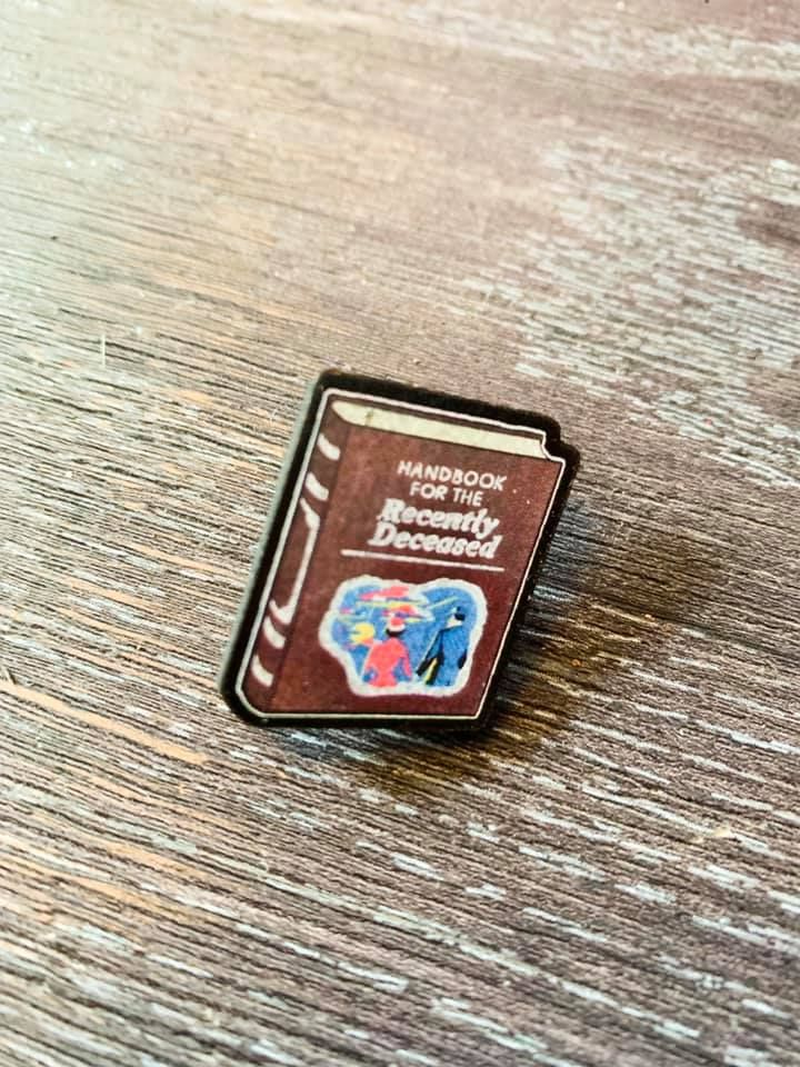 Set of 2 Handbook For The Recently Deceased/ Sandworm Pin Badge