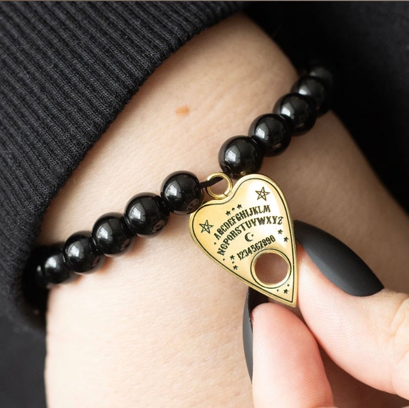 TALKING BOARD PLANCHETTE BEADED CHARM BRACELET Rrp £9.99