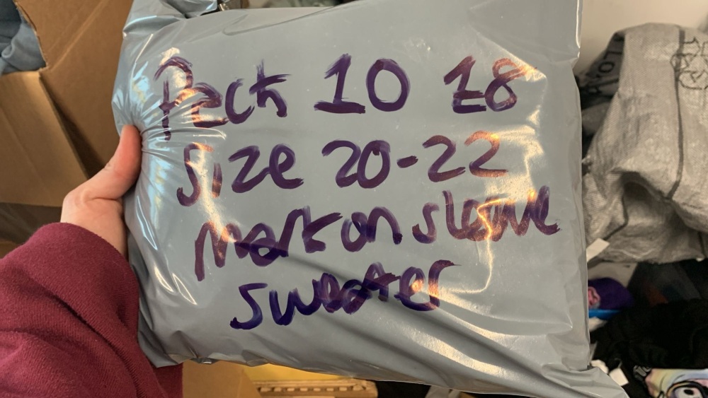 Mystery Pack 10 size 20-22 sweater (mark on sleeve)