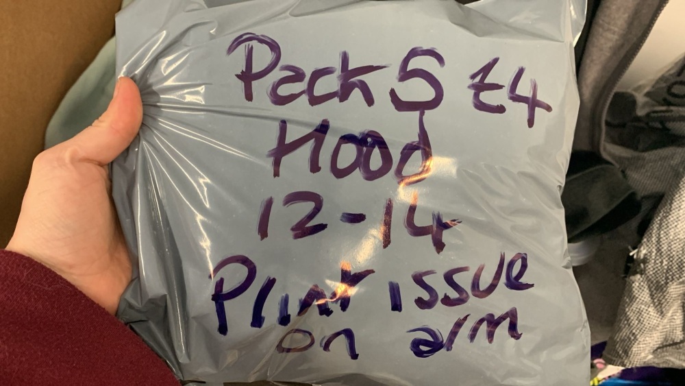 Mystery Pack 5 size 12-14 hood (print issue on arm)
