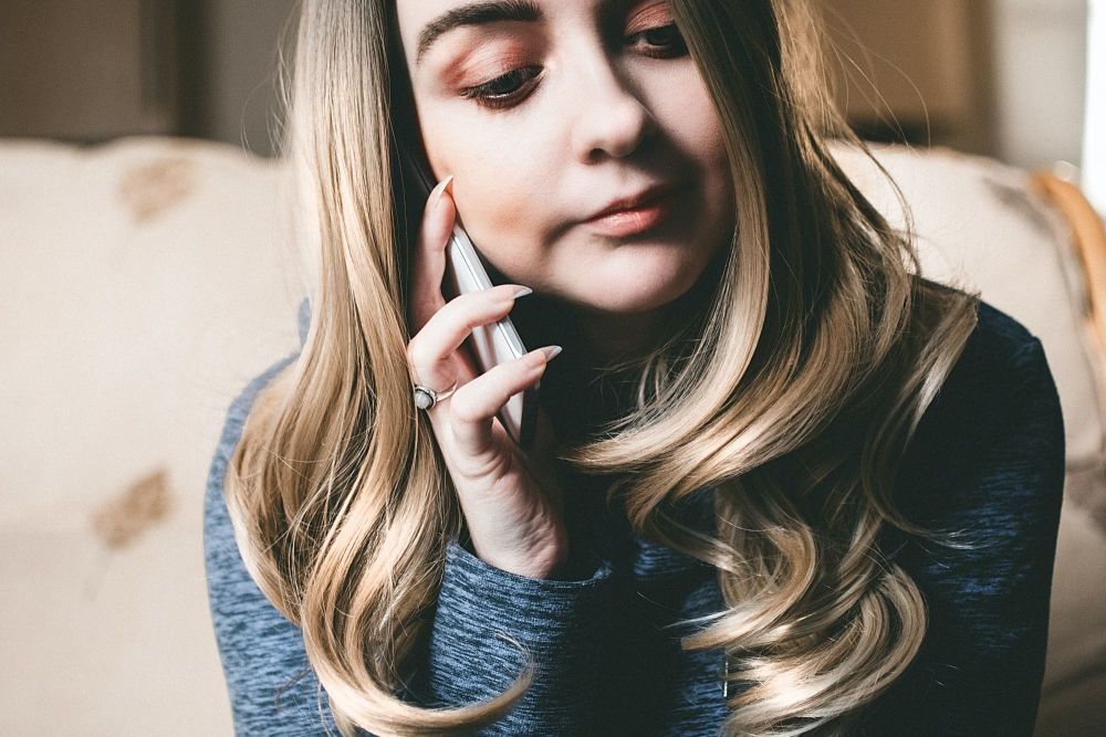 woman-using-her-mobile-phone
