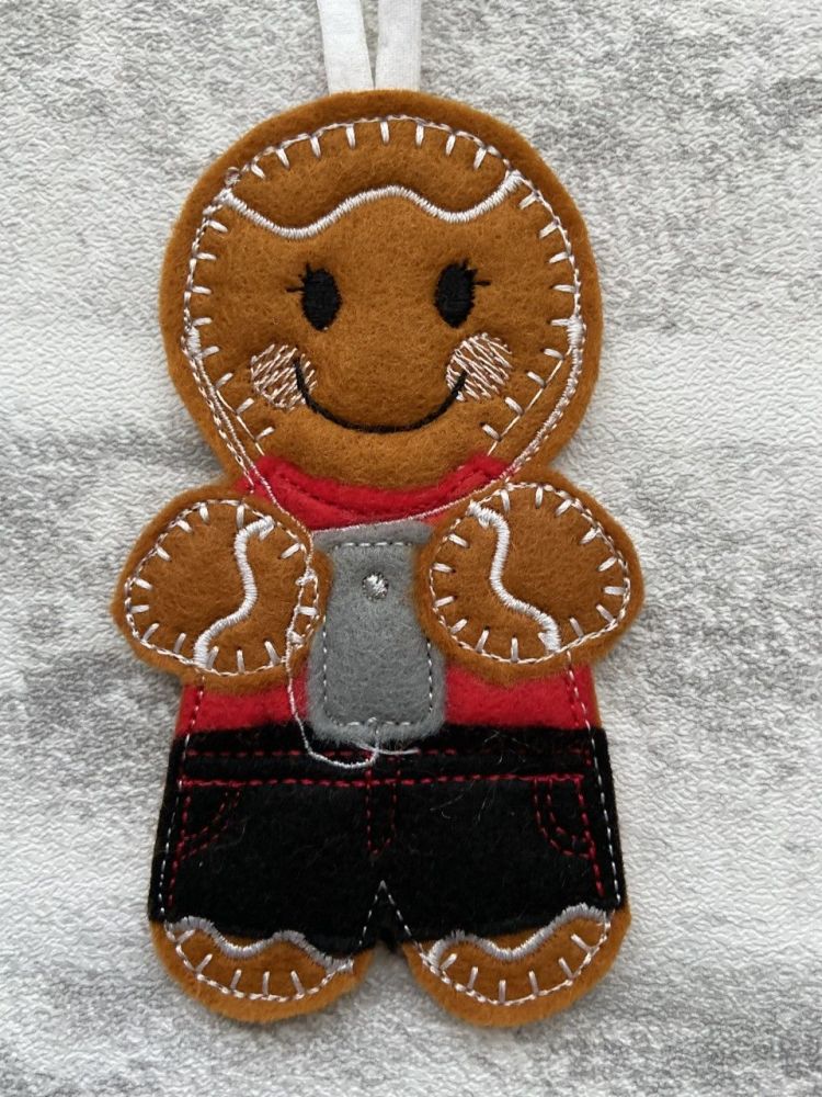 Gingerbread teenager with mobile phone